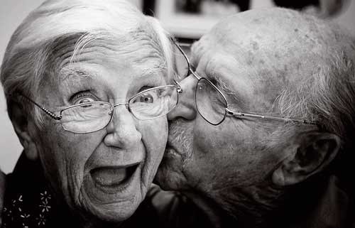 two old people laughing